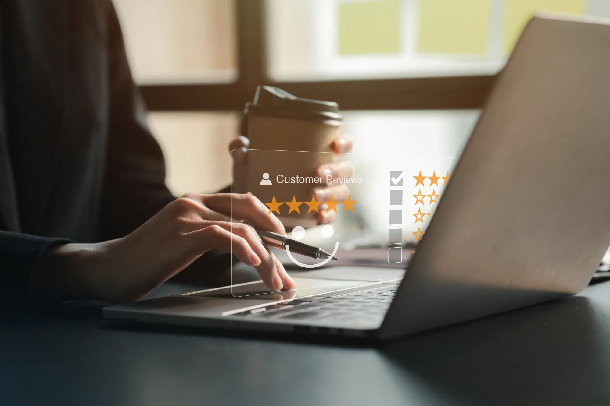 A contractor reading reviews of his business on a laptop.